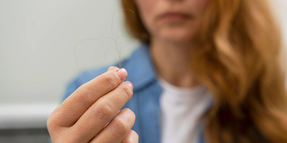 queda de cabelo causada por oxandrolona